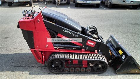 mini wheeled skid steer toro|stand on mini skid steer.